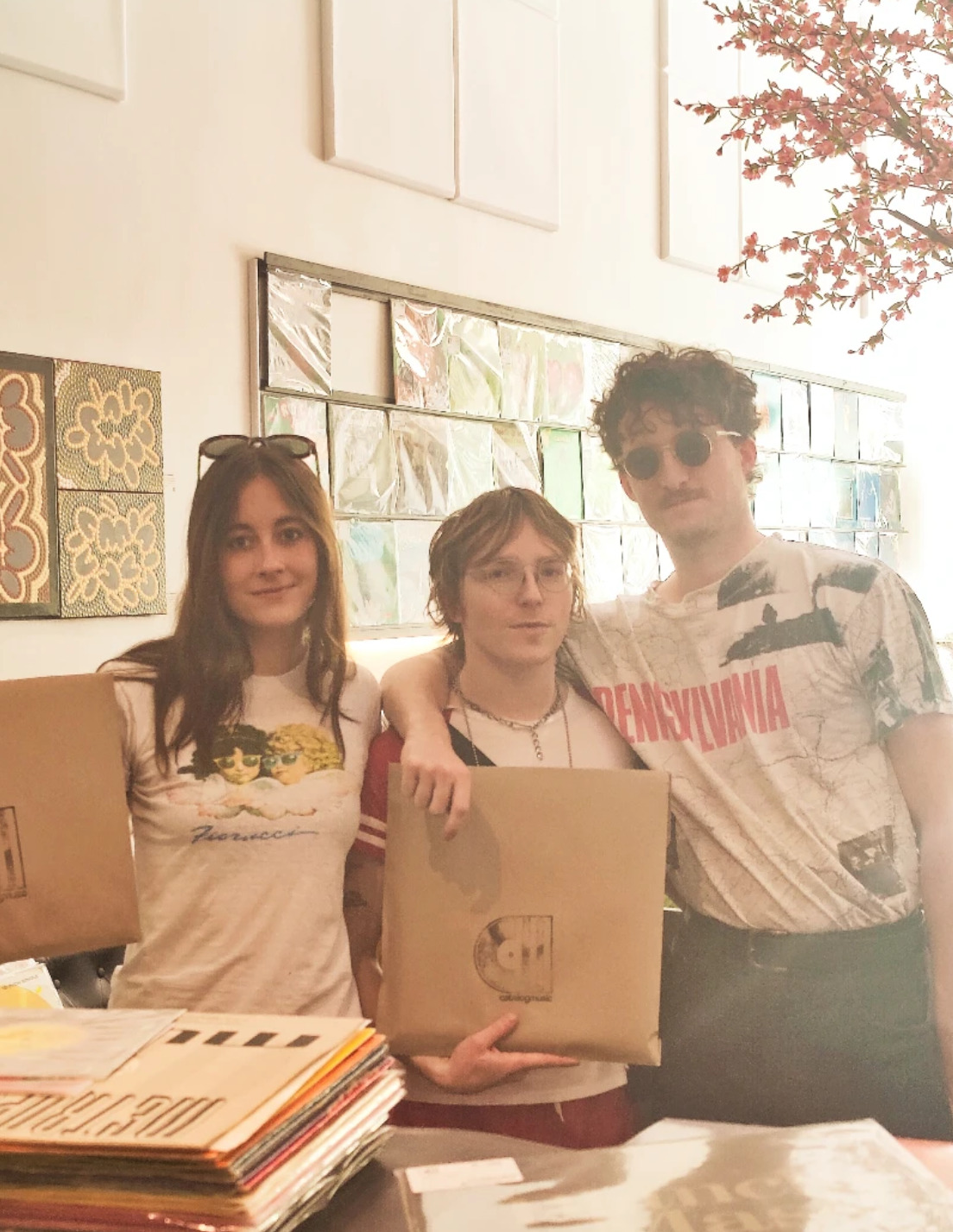 three friends with catalog bags